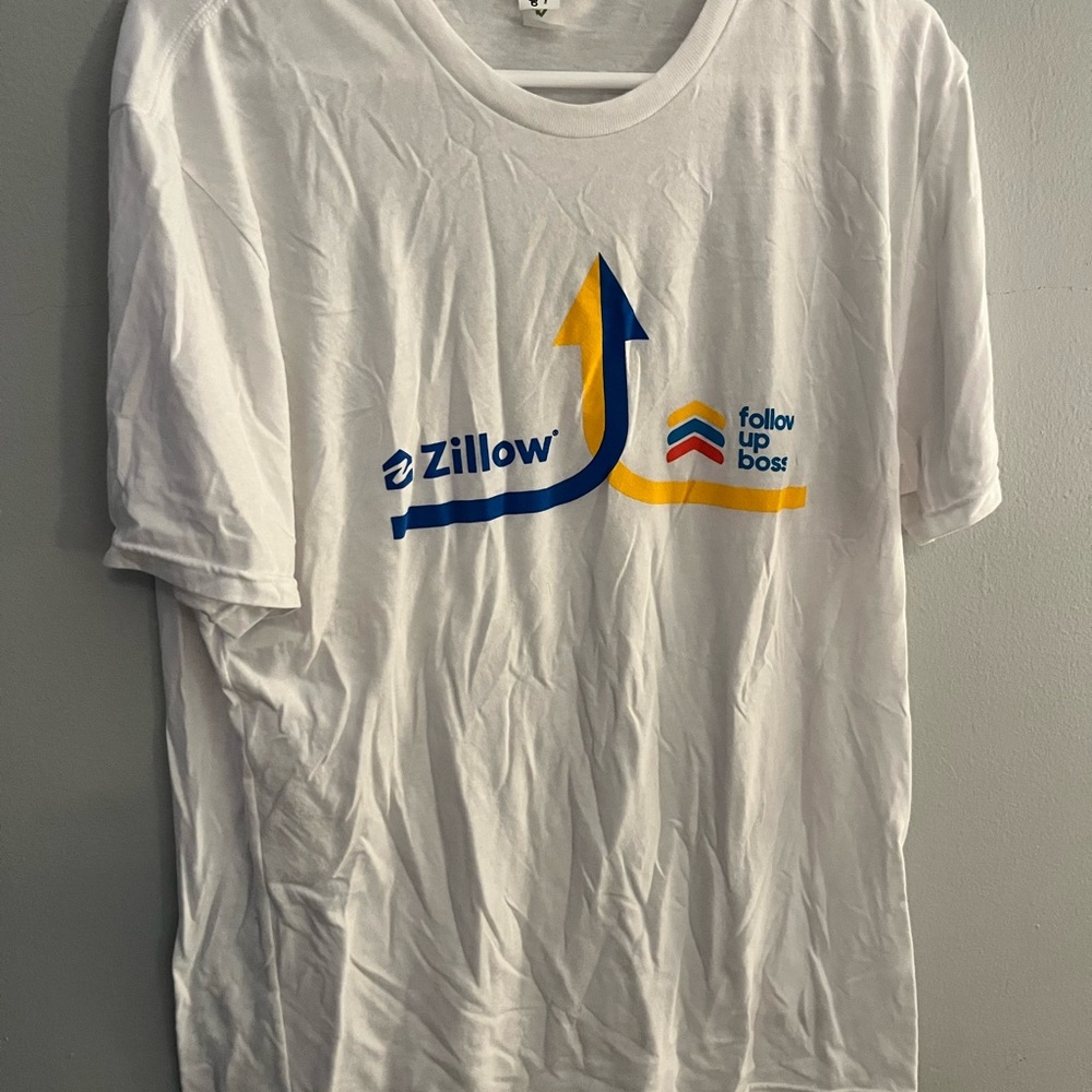 Large white tee of Zillow and Follow Up Boss